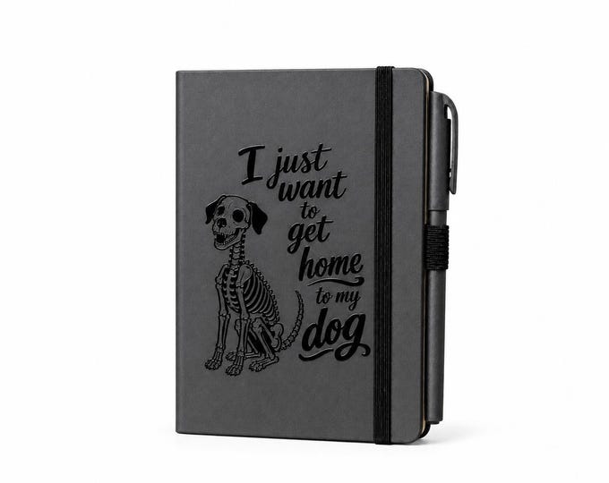I just want to get home to my dog skeleton notebook with pen