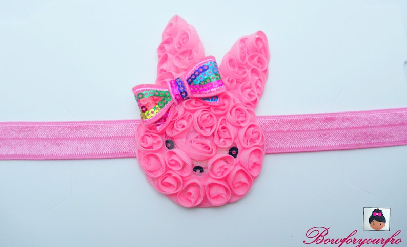 multicolor small bow added to the pink bunny handmade perfect for Easter outfit Pink Easter Bunny headband and ready to ship.