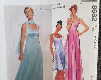 May include: A sewing pattern for a dress with a scoop neck and a flowing skirt. The pattern is for sizes 4, 6, and 8. The pattern is called McCall's 8682.