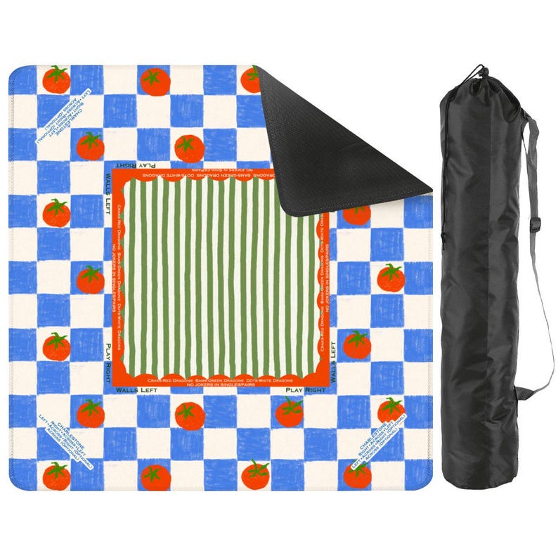 May include: A picnic blanket with a blue and white checkered pattern, orange tomatoes, and a green and white striped center. Includes a black carrying bag with a shoulder strap. The blanket has text that reads "Walls Left" and "Play Right."
