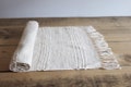Natural cream cotton table runner with jute stripe product logo