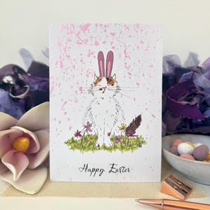 Carte de lapin de Pâques avec chat, imprimée avec des détails en poudre de mica finis à la main