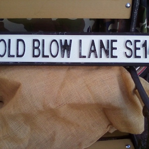 COLD BLOW LANE SE14 retro style wooden football street sign. Makes a great gift for Millwall fans. Size 63 X 11 cm. Man cave wall decor.