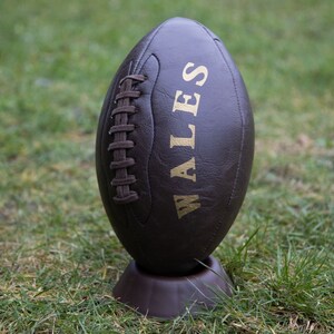 WALES RUGBY antique leather style display ball with optional display stand. Makes a fantastic gift for Welsh rugby fans.