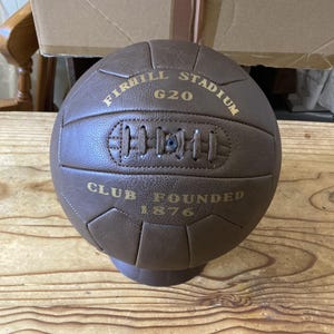 Antique leather style display football printed with Firhill Stadium G20.  A fantastic gift for Partick Thistle fans.