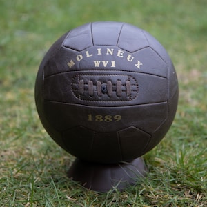 Antique leather style display football with MOLINEUX WV1. Makes a fantastic gift for Wolves fans.