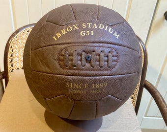 Antique leather style display football with Ibrox Stadium G51. Makes a fantastic gift for Rangers fans.