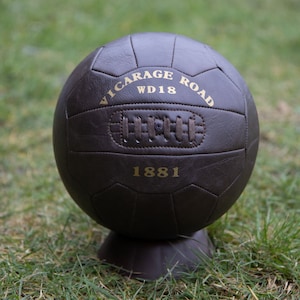 Antique leather style display football with VICARAGE ROAD WD18. Makes a fantastic gift for Watford fans.