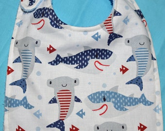 Baby Bib  9-12 month plus,  Reversible, blue and gray sharks , 100%  cotton white cotton terry cloth back and white snap 9.00