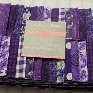 Jelly Roll Prints Purple MDG , 40 strips 2 1/2 x 45 " 100 percent Quality Cotton.