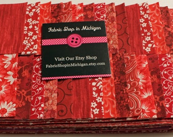 Jelly Roll Prints Reds MDG  Jelly Roll, 40 strips 2 1/2 x 45 &quot; 100 percent Quality Cotton.