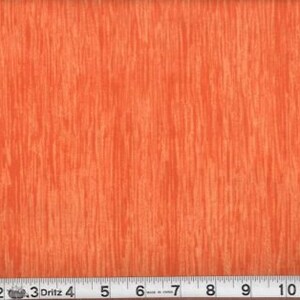 Puede incluir: Tela naranja con un patrón de veta de madera. La tela es texturizada y tiene un brillo sutil.