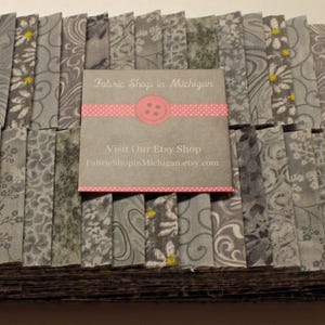 Jelly Roll Prints Gray, 40 strips 2 1/2 x 44 " 100 percent Quality Cotton.