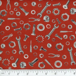 May include: Red fabric with a repeating pattern of silver tools and hardware. The tools include wrenches, screwdrivers, nuts, bolts, and washers.