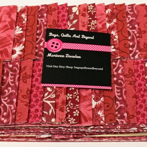 Jelly Roll Prints Burgundy MDG Jelly Roll, 40 strips 2 1/2 x 44 " 100 percent Quality Cotton.