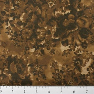 May include: A brown fabric with a floral pattern. The flowers are a darker brown and have a faded look. The fabric has a subtle texture.