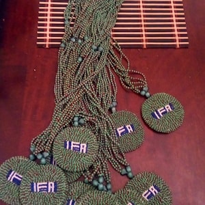 lleke Orun,Orishas and Ifa Medallion glass beaded  Necklaces