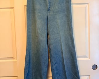 Vintage 1970s Levi’s orange tab wide leg flares with zipper fly and elastic waist