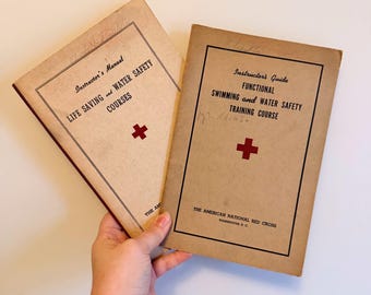 Vintage set of two American Red Cross swimming, water safety, and life saving course books