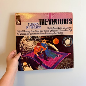 May include: A set of three ceramic mugs with a speckled, matte finish. The mugs are in shades of cream, light gray, and dark gray. Each mug has a simple, minimalist design, perfect for coffee or tea.