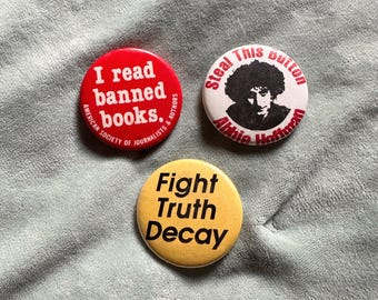 Choice of vintage counter culture 1960s 70s pinback pin Abbie Hoffman Banned Books Truth Decay