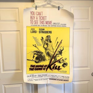 May include: Vintage movie poster for "The Name of the Game is Kill" with a yellow background. The poster features a woman, a car, and action elements. Text includes the title, cast, and a warning about the ending.