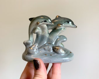 Vintage Midcentury lusterware Florida souvenir of dolphins swimming in blue water figurine