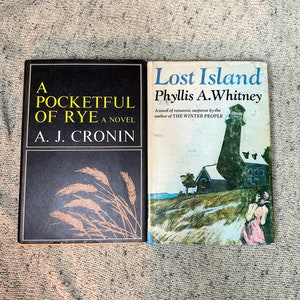 Choice of vintage first edition hardcover book novel 1969 Pocketful of Rye by A J Cronin or 1970 Lost Island by Phyllis Whitney