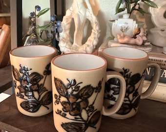 Set of three vintage stoneware ceramic mugs brown and tan floral
