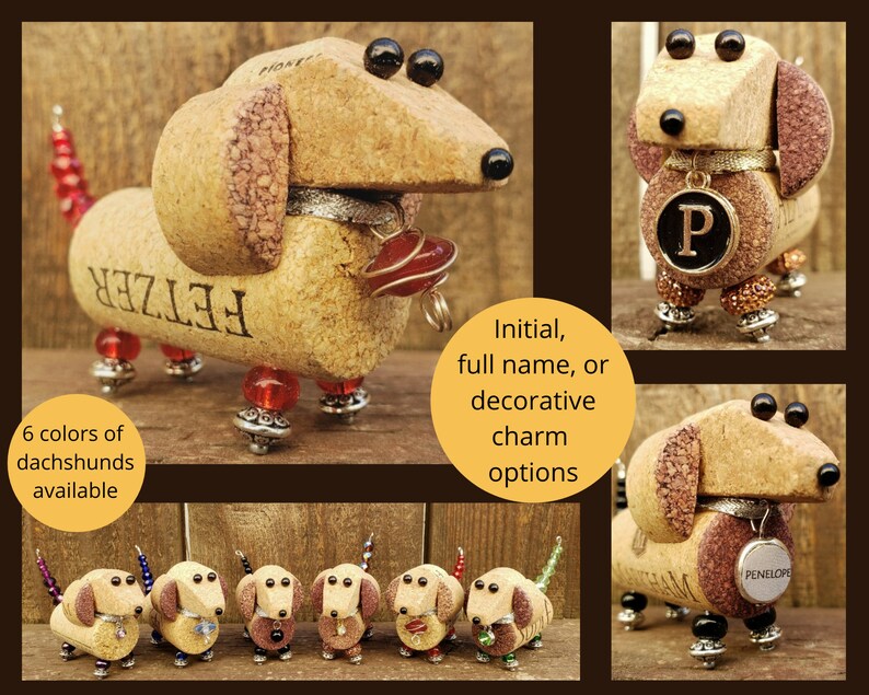 May include: Six miniature dachshund figurines made from wine corks. The dachshunds are in various colors, including brown, black, and white. Each dachshund has a personalized name tag, such as "FETZER" and "PENELOPE".