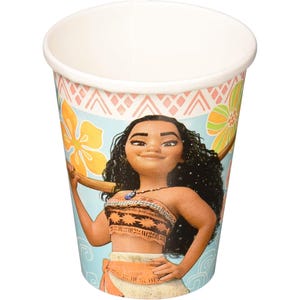 May include: A disposable paper cup featuring a light blue background with a printed illustration of a character with long dark curly hair, wearing an orange patterned top and skirt, surrounded by yellow and green tropical flower graphics.