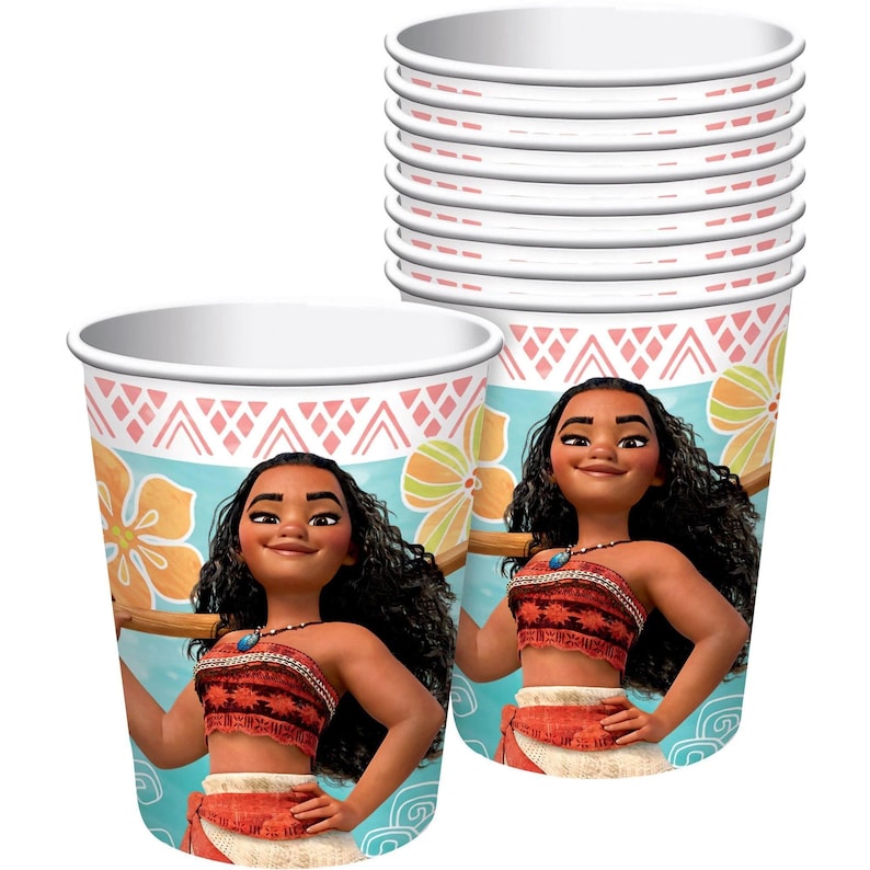 May include: A stack of white paper cups featuring a graphic of the character Moana with long dark hair, wearing a red patterned top and skirt. The background of the cups is light blue with yellow hibiscus flowers and a pink geometric border.