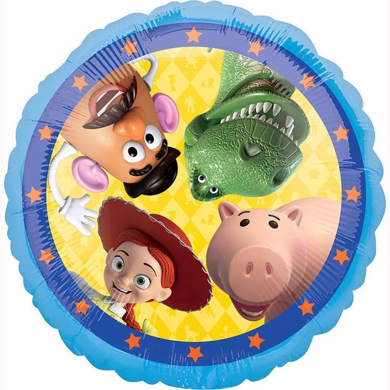 May include: A round foil balloon featuring a yellow diamond-patterned center with illustrations of Mr. Potato Head, Rex the dinosaur, Jessie the cowgirl, and Hamm the piggy bank. The balloon has a blue border decorated with orange stars.