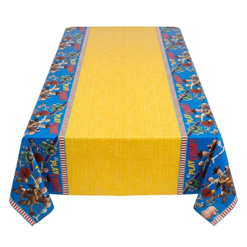 May include: A rectangular plastic tablecloth featuring a bright yellow centre panel and blue borders decorated with Toy Story character graphics. The blue edges include the repeating text "IT'S PLAY TIME!" in red and white lettering alongside various figures.