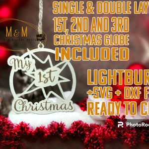 May include: A white wooden Christmas ornament with the text "My 1st Christmas" and a starburst design. The ornament includes the text "SINGLE & DOUBLE LAYERS", "1ST, 2ND AND 3RD CHRISTMAS GLOBE INCLUDED", "LIGHTBURN +SVG + DXF FILE READY TO CUT".
