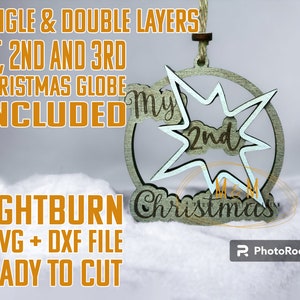 May include: A wooden Christmas ornament with the text "My 2nd Christmas" inside a starburst design. The ornament is layered and includes the text "SINGLE & DOUBLE LAYERS" and "READY TO CUT".