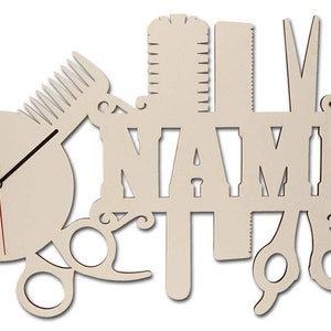 May include: A wooden wall clock with a white background and black hands. The clock is shaped like a pair of scissors, a comb, and a razor. The word "NAME" is cut out of the wood and is in the center of the clock.