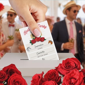 May include: A hand places a Kentucky Derby betting ticket into a white box. The ticket features the words "Kentucky Derby" and "Journalism Horse" with a horse illustration. Red roses are in the foreground.