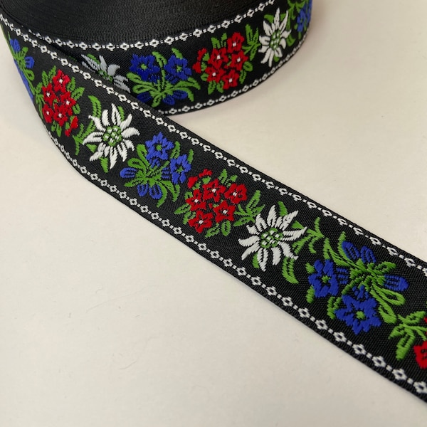 Edelweiss multi flower Scandinavian Jacquard woven fabric trim, thick but soft to the touch, 1 5/8 inch wide, sold by the yard.