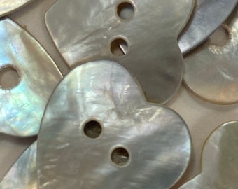 5 heart shape mother of pearl buttons, in very good vintage or new condition. #91