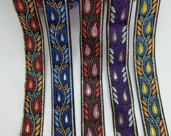 Vine woven fabric trim, metallic, 3/4 inch wide, sold by the yard.