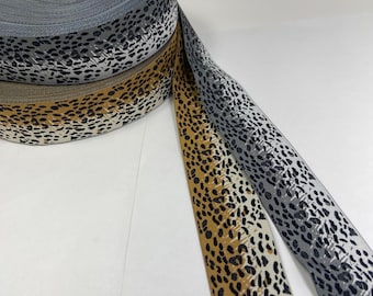 Animal fancy,  1 1/2 inch wide, jacquard woven fabric trim, sold by the yard.