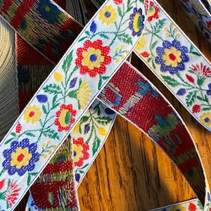 Floral multicolor, 3/4 inch wide, jacquard woven fabric trim, sold by the yard.