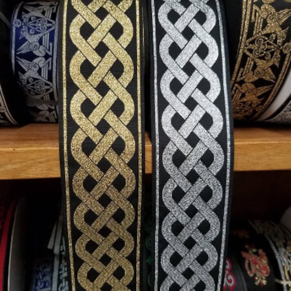 2” Celtic woven metallic gold or silver fabric trim, sold by the yard.
