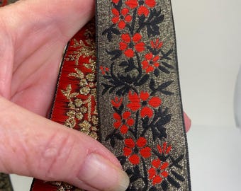Red metallic dogwood, jacquard woven trim 1 1/2 inch wide, sold by the yard.