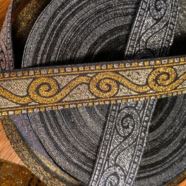 Metallic scroll yellow gold or silver fabric trim, 3/4 inch wide, sold by the yard.