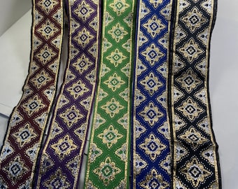 2” Royal woven metallic fabric trim, blue or purple, sold by the yard.
