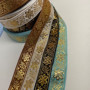 Floral Metallic 1 inch wide jacquard woven fabric trim, sold by the yard.