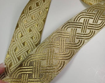 2 1/8” Gold Celtic knot jacquard woven trim, sold by the yard.