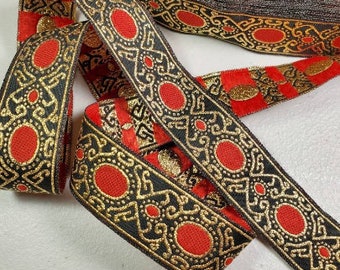 Medieval red and gold 1 inch wide jacquard woven fabric trim, sold by the yard.